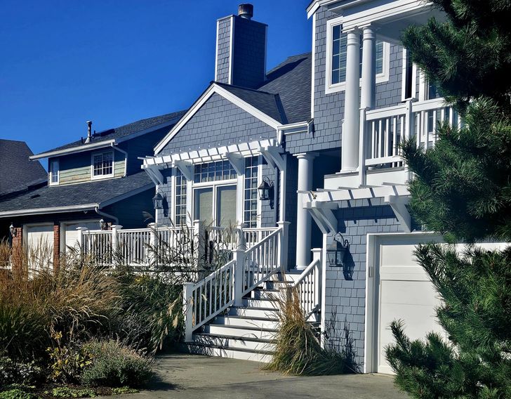 blue painted craftsman home