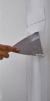 interior of a newly painted dark grey bathroom